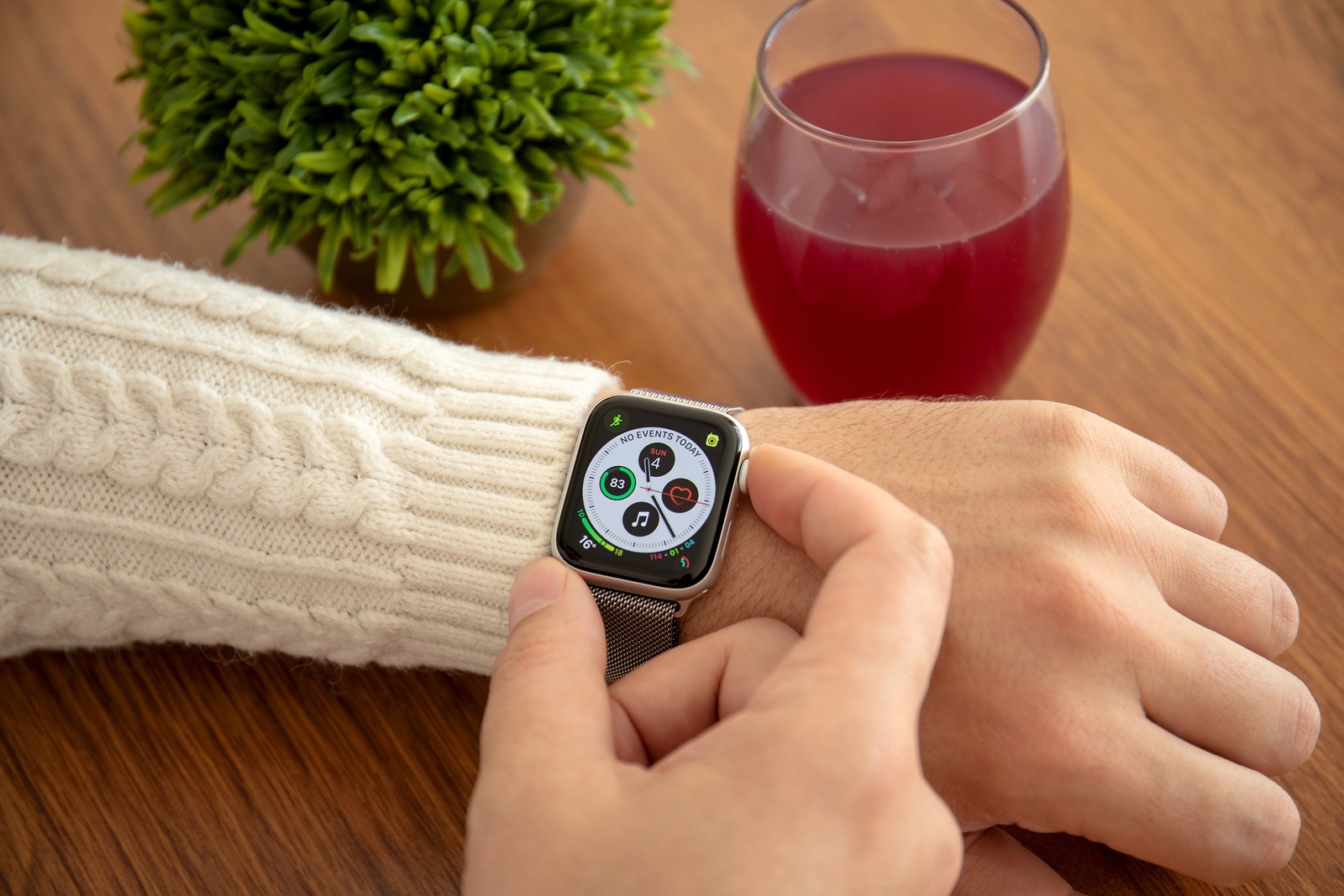 Alushta, Russia - November 4, 2018: Man hand with Apple Watch Series 4 in the home. Apple Watch was created and developed by the Apple inc.