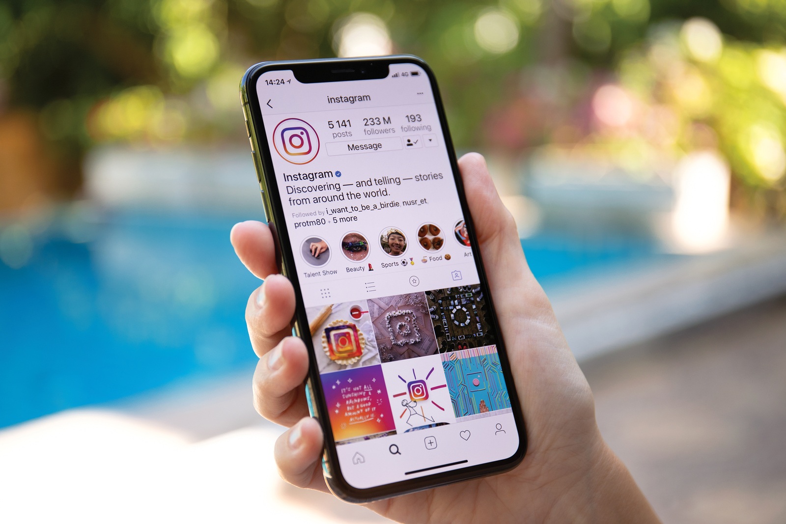 Koh Samui, Thailand - March 21, 2018: Woman hand holding iPhone X with social networking service Instagram on the screen. iPhone 10 was created and developed by the Apple inc.