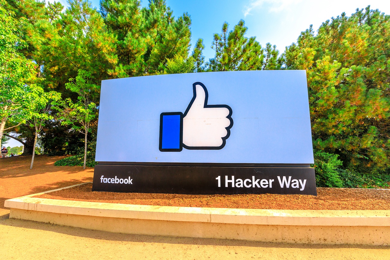 Menlo Park, California, United States - August 13, 2018: A sign at entrance to Facebook Headquarters, world leader social network company, 1 Hacker Way, Silicon Valley. The Facebook Like Button sign.