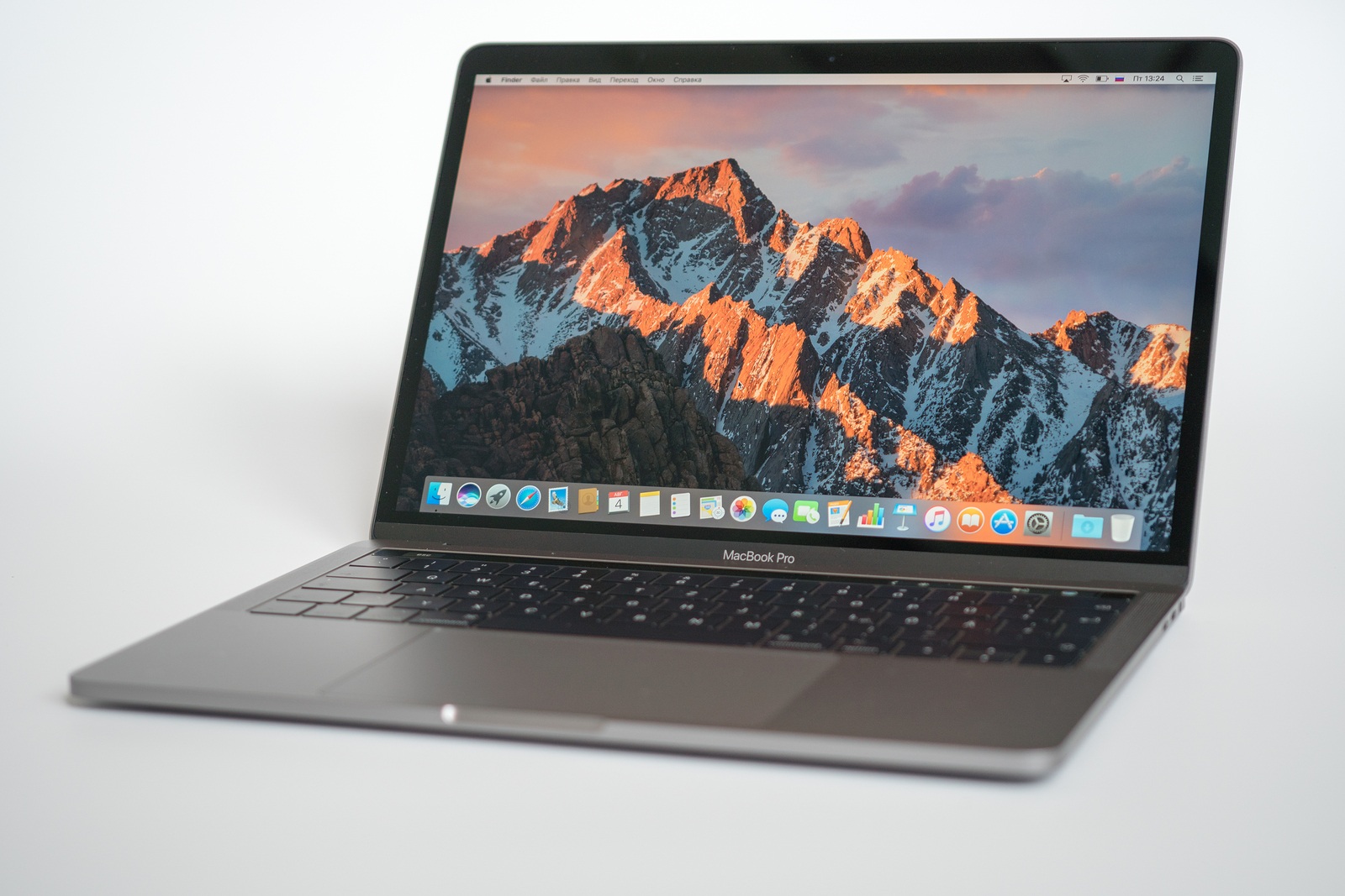 Berlin, Germany - May 21, 2017 : MacBook Pro with macOS Sierra background on the screen. MacBook Pro Retina 15-inch was created and developed by the Apple inc.