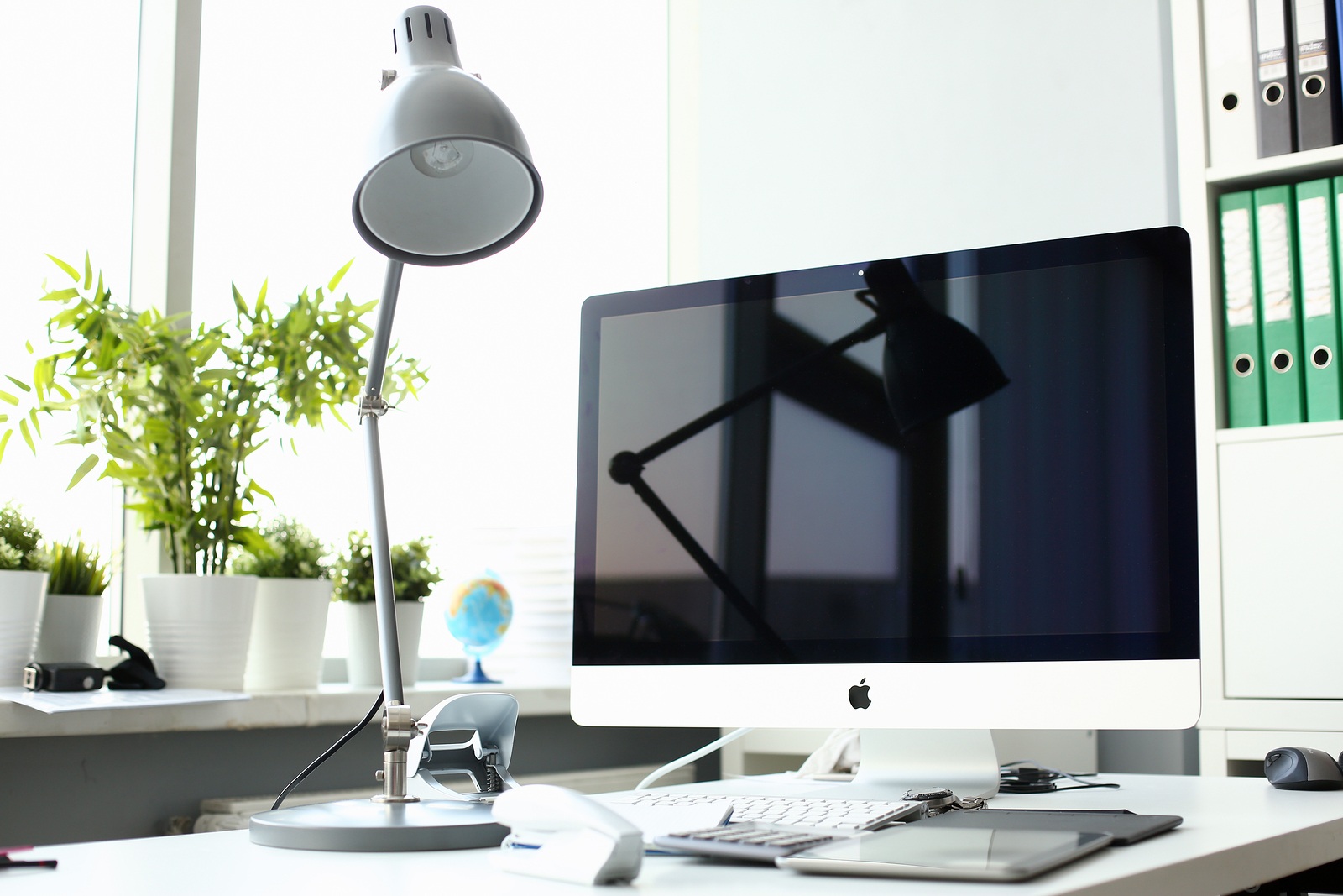 Minsk, Belarus - January 10, 2019 : Apple imac in office table Illustrative editorial