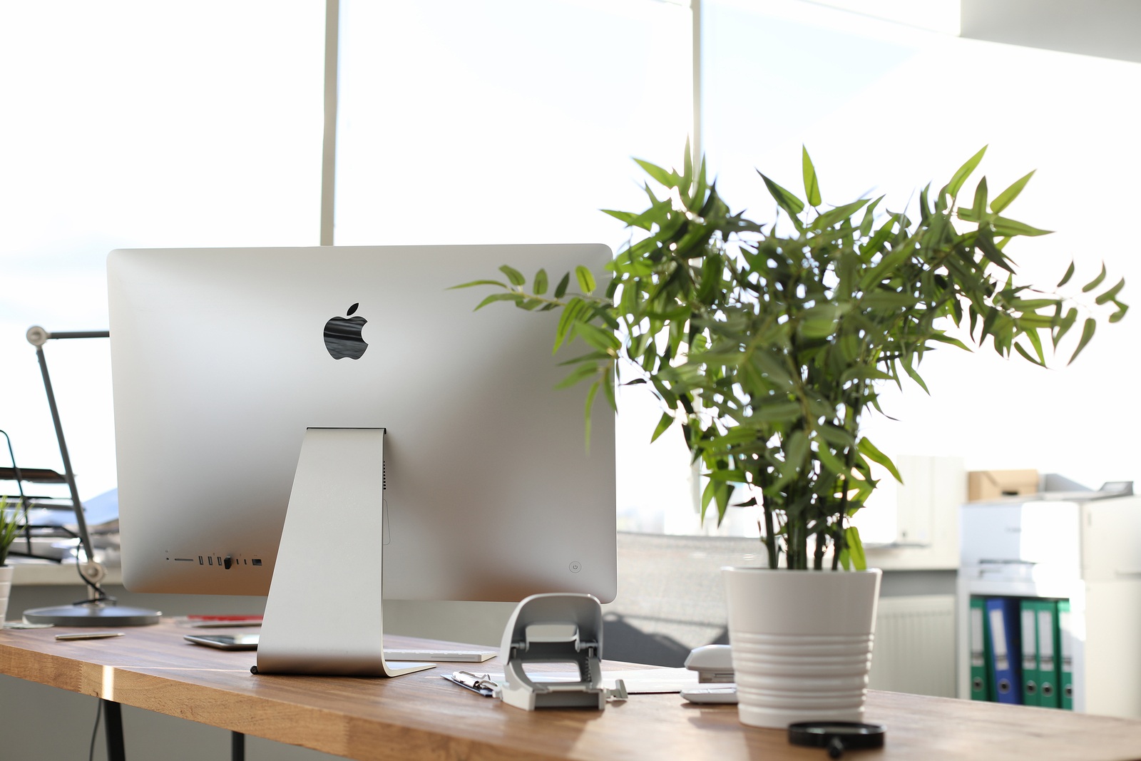 Minsk, Belarus - 25 September 2019: Modern pc apple imac on office table. Illusttative editorial.