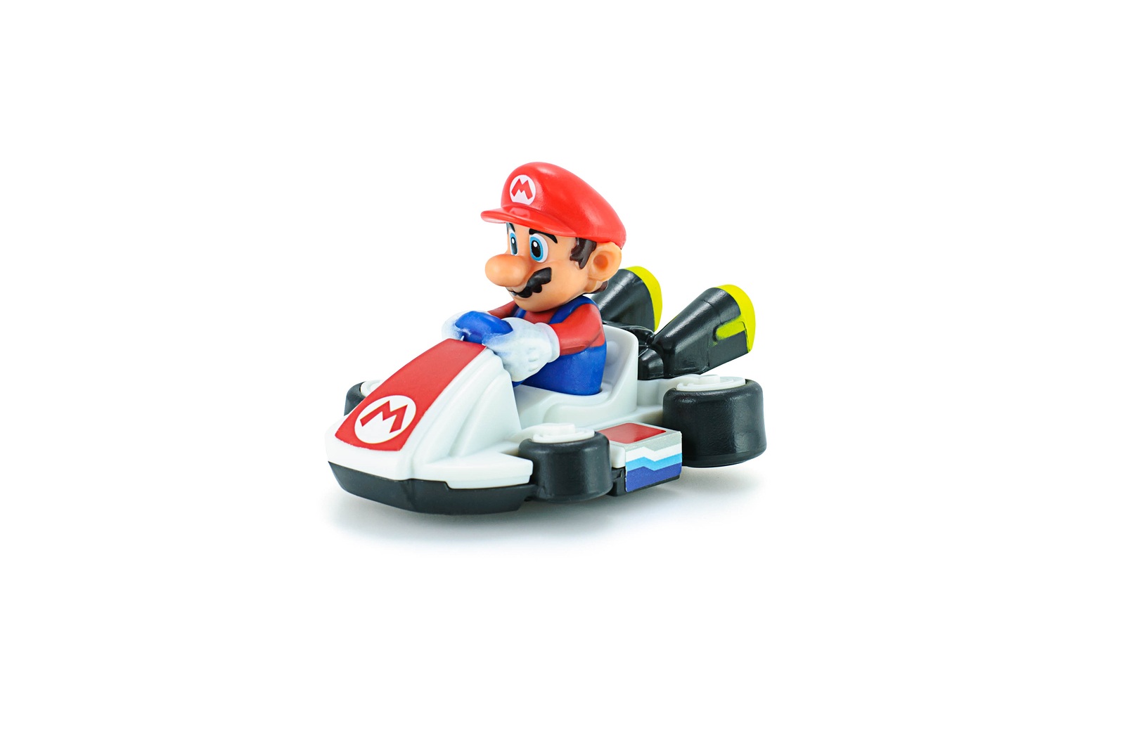 Bangkok, Thailand - May 12, 2015: Super Mario kart figure toy on white background. There are plastic toy sold as part of the McDonald's Happy meals.