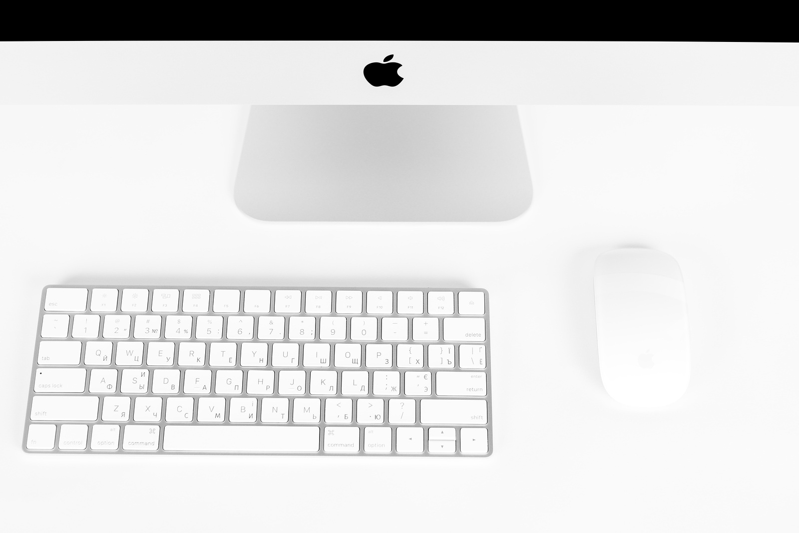 UKRAINE, RIVNE, 4 March, 2019. Apple Computer iMac 27 retina display 5K keyboard and magic mouse isolated on a white background