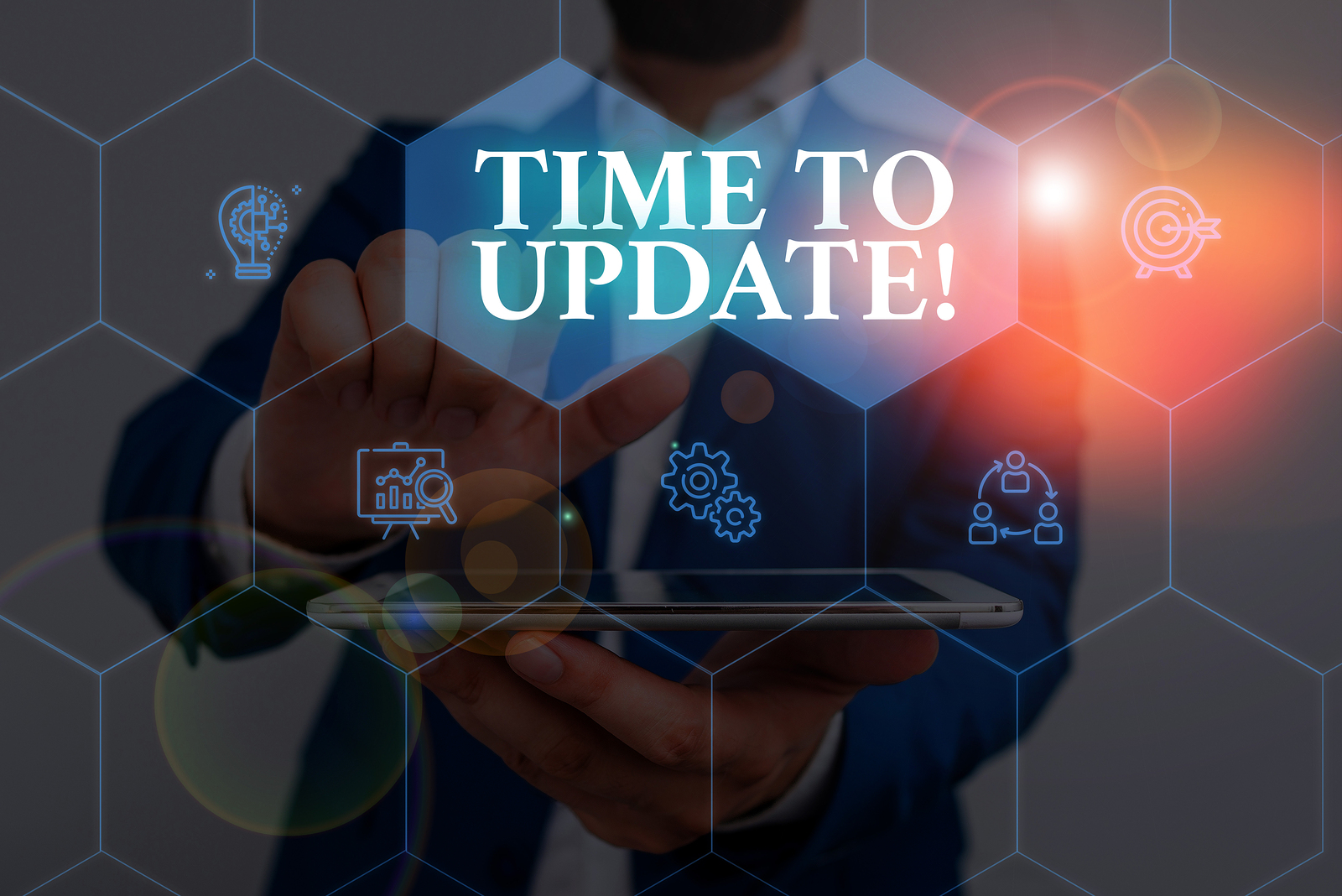 Writing note showing Time To Update. Business photo showcasing act updating something someone or updated version program Male wear formal work suit presenting presentation smart device.