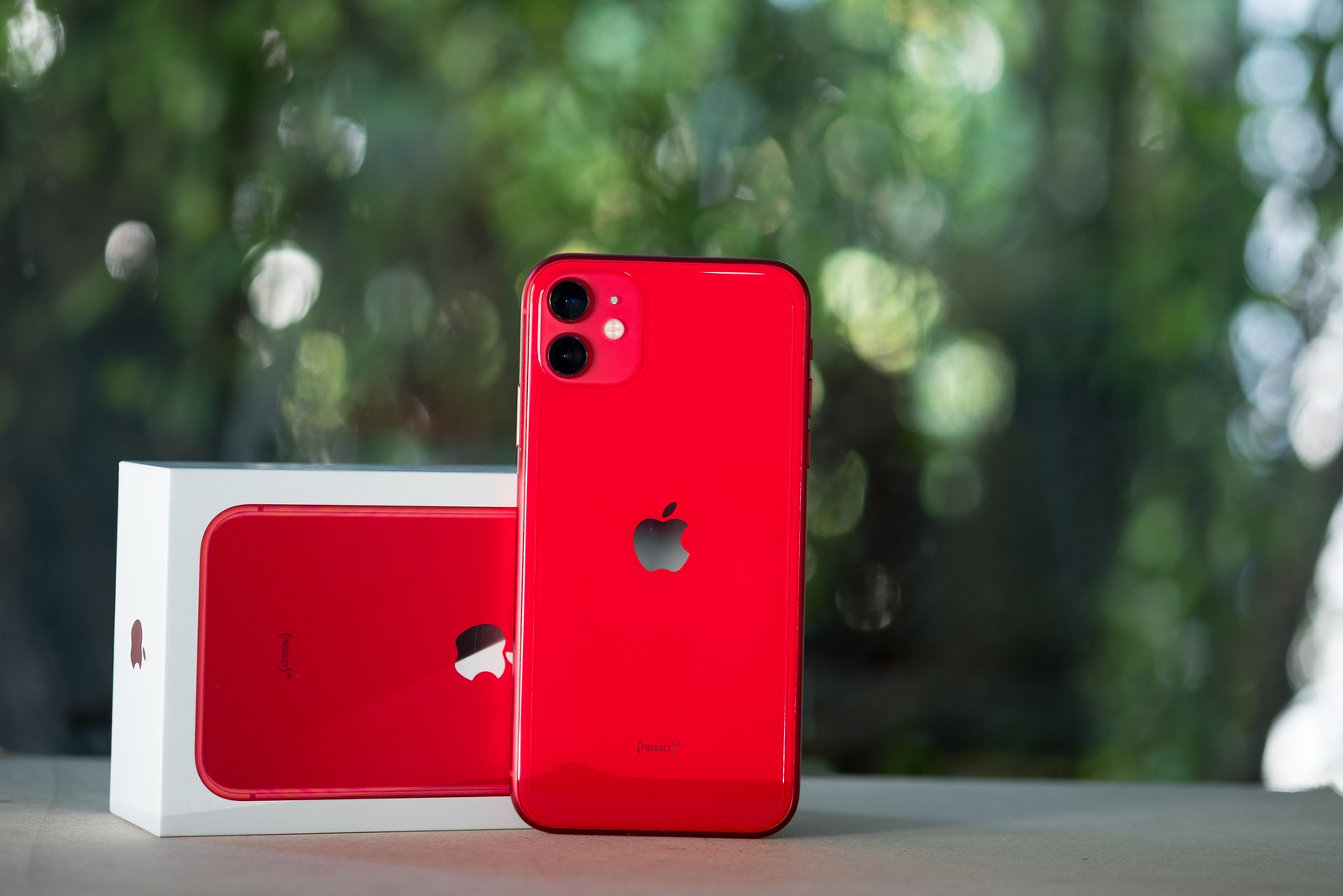 Bangkok, Thailand - November 25, 2019: New Apple iPhone 11 red smartphone. IPhone 11 was created and developed by the Apple inc.