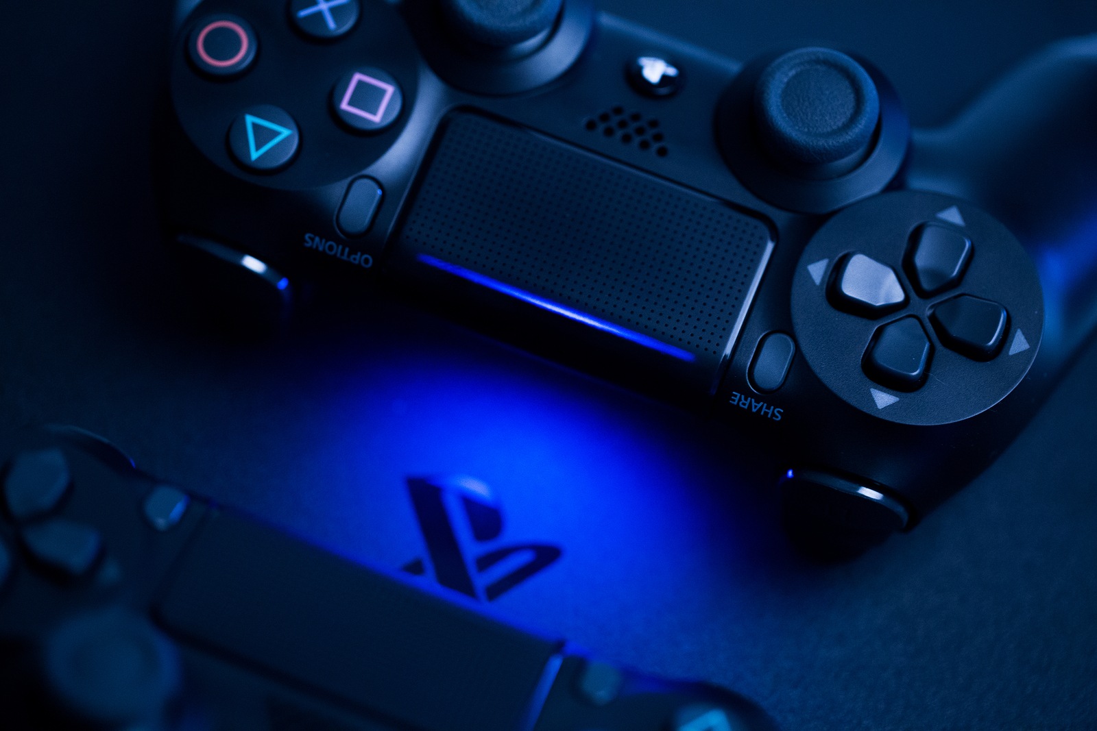 Russia, OKTOBER 24 2019: The new Sony Dualshock 4 with PlayStation 4. Sony PlayStation 4 game console of the eighth generation.