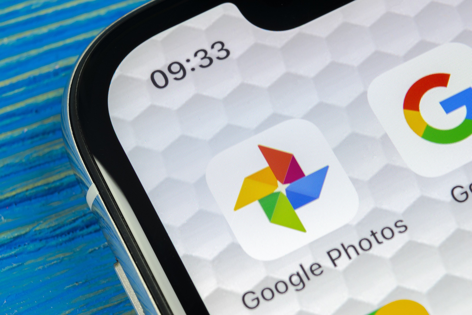 Sankt-Petersburg, Russia, June 20, 2018: Google Photos plus application icon on Apple iPhone X screen close-up. Google plus Photos icon. Google photos application. Social media network