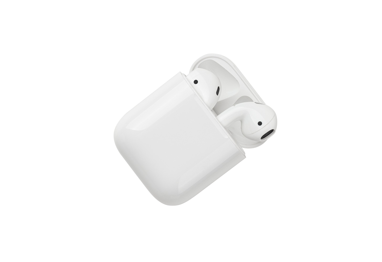 Rostov-on-Don, Russia - December 2019. Apple AirPods on a white background. Wireless headphones in a charging case close-up.