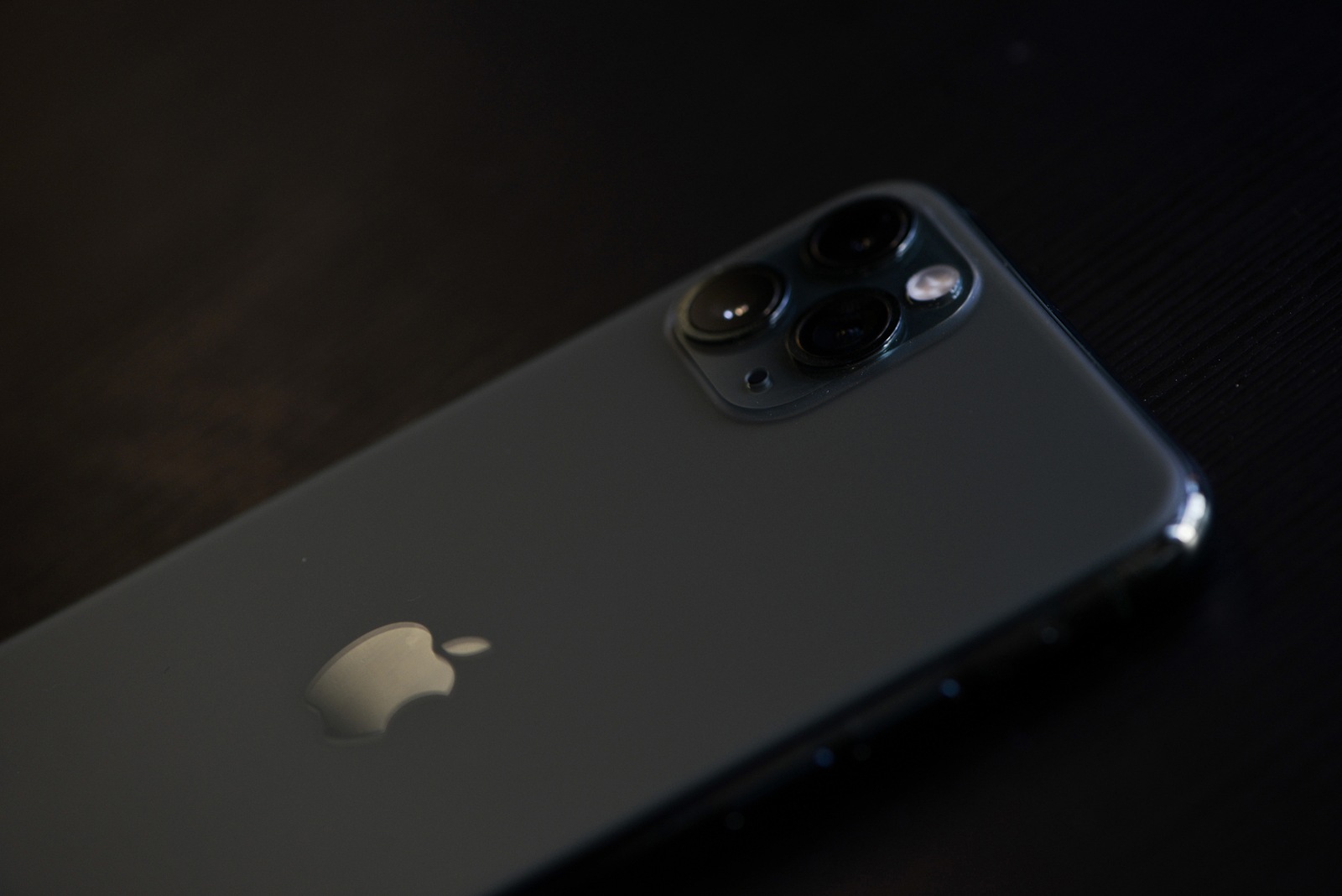 Shanghai, China: November 19, 2019: Brand new stylish iPhone 11 Pro Max with significant triple cameras beside