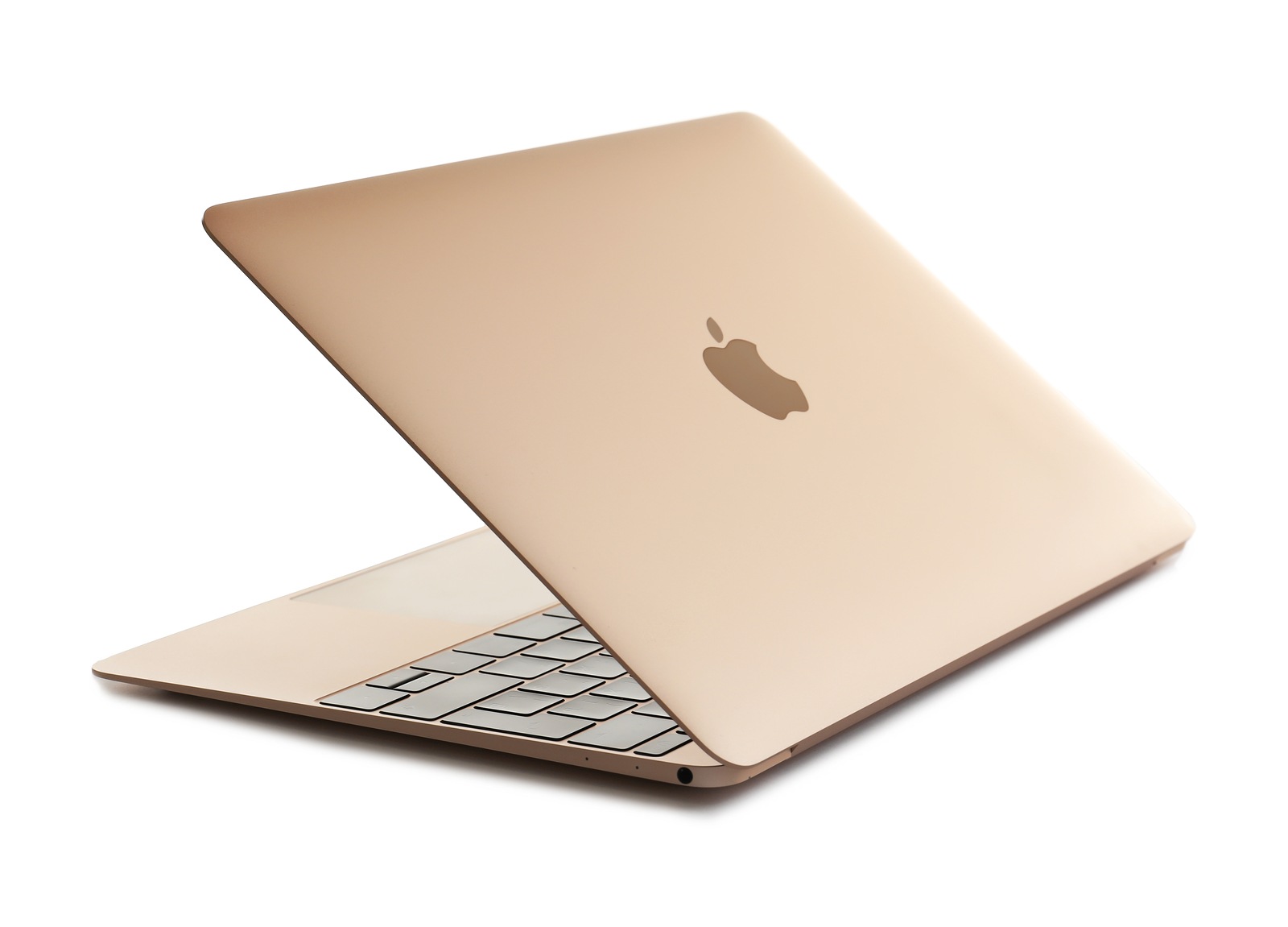 KIEV, UKRAINE - OCTOBER 12, 2017: Apple gold MacBook on white background