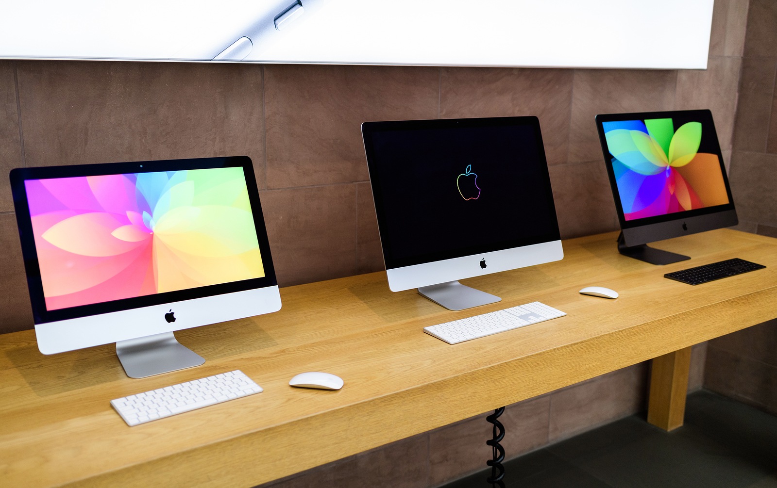 PARIS, FRANCE - NOV 7, 2018: Apple Computers iMac range featuring 24, 27, and the Professional iMac Pro computers