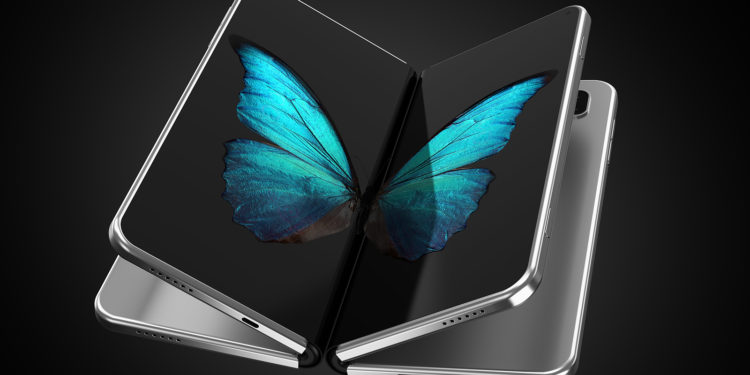 Concept of two foldable smartphone folded and placed next to each other with butterfly image on screens. Flexible smartphone isolated on black background. 3D rendering