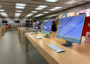 Orlando, FL USA - September 20, 2021:  A row of iMac Computers at an Apple store.