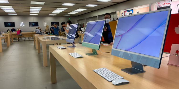 Orlando, FL USA - September 20, 2021:  A row of iMac Computers at an Apple store.